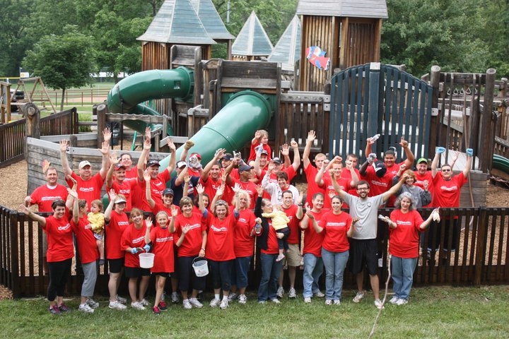 People standing in front of playground